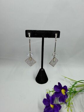 Silver-Tone Sparkle Drop Earrings with Baguette Cut Crystal and Bow Accent